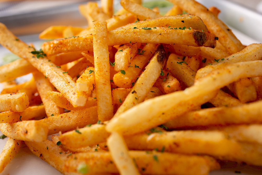 Acrylamide is produced during the preparation of certain foods such as french fries and is considered as probably carcinogenic to humans. However, its levels have been reduced with the help of food chemistry.